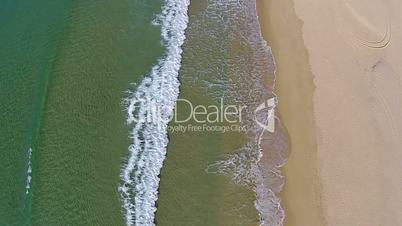 Waves Crashing on Beach, aerial view