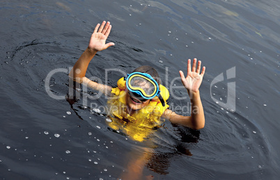 Young boy swimming