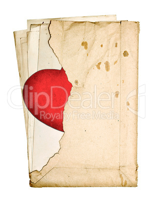 stack of old papers in a torn envelope