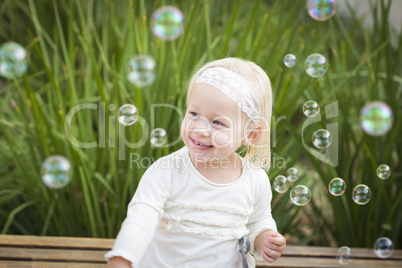 Adorable Little Girl Having Fun With Bubbles