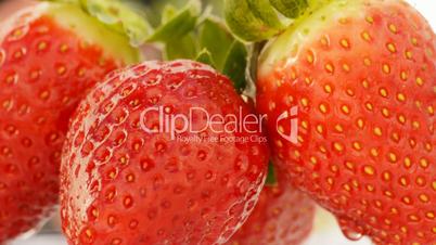 Delicious strawberries, close up. Loop