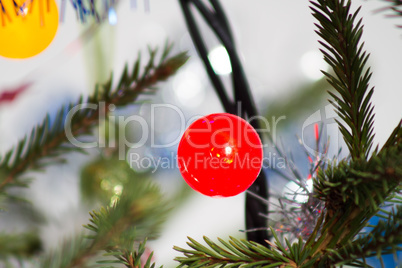 Bright garland on a Christmas tree abstract festive background