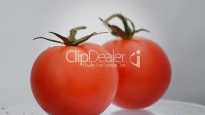 Cherry tomatoes in rotating, loop