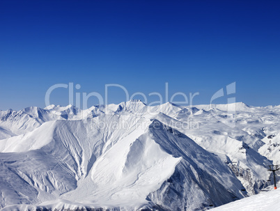 Winter mountains and blue clear sky at nice day