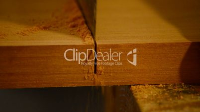 Luthier, carpenter or craftsman cutting wood, close up