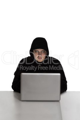 Hacker on silver laptop