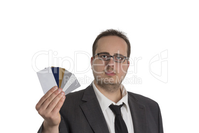 Man in suit with credit cards