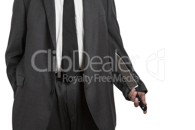 Man in suit with large knife
