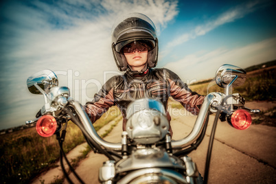 Biker girl on a motorcycle