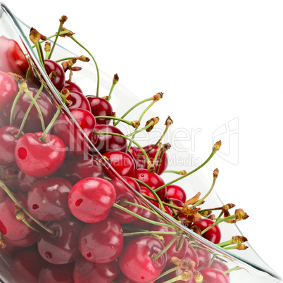 fruits of cherries in a glass bowl