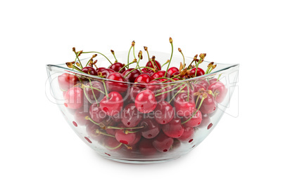 fruits of cherries in a glass bowl