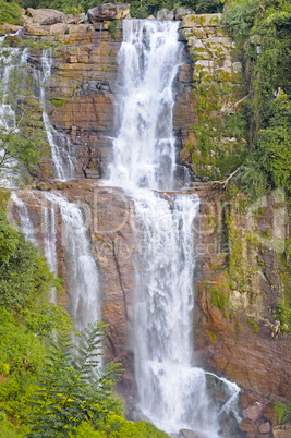 big waterfall in the mountains