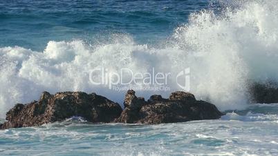 Waves Crashing on Stone Beach, slow motion