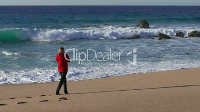 Woman Make Photo Waves in Ocean on Beach