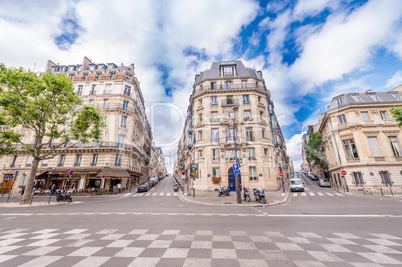 PARIS - JUNE 12, 2014: Tourists walk ain Avenue Kleber. Paris is