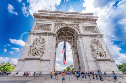 PARIS, FRANCE - JUNE 20, 2014: Tourists enjoy Triumph Arc view o