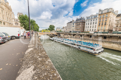 PARIS - JUNE 19, 2014: Bateau Mouche on the river. Bateaux Mouch