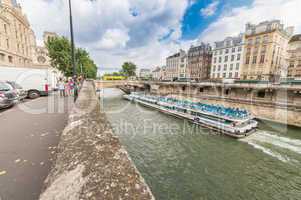 PARIS - JUNE 19, 2014: Bateau Mouche on the river. Bateaux Mouch