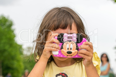 PARIS, FRANCE - JULY 20, 2014: Baby girl enjoy city view with he