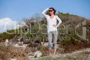 beautiful woman relax in summer outdoor in wind dune beach