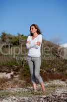 beautiful woman relax in summer outdoor in wind dune beach