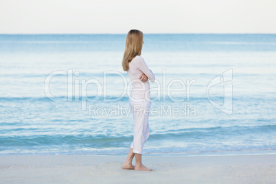 beautiful blonde woman alone at the beach