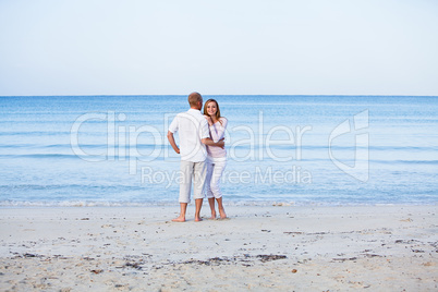 happy couple in love having fun on the beach