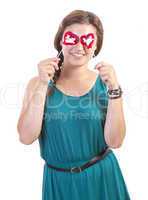 smiling teenager girl with heart shaped lollipop