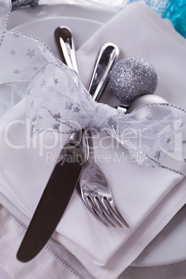 Stylish blue and silver Christmas table setting