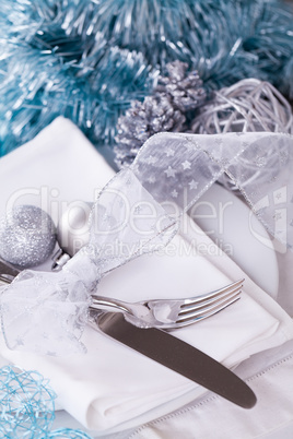 Stylish blue and silver Christmas table setting