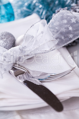 Stylish blue and silver Christmas table setting