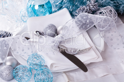 Stylish blue and silver Christmas table setting