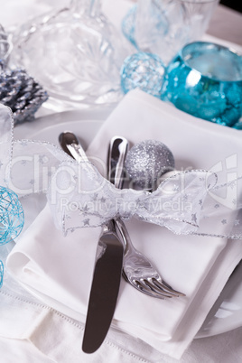 Stylish blue and silver Christmas table setting