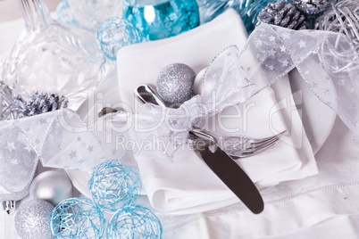 Stylish blue and silver Christmas table setting