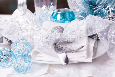 Stylish blue and silver Christmas table setting