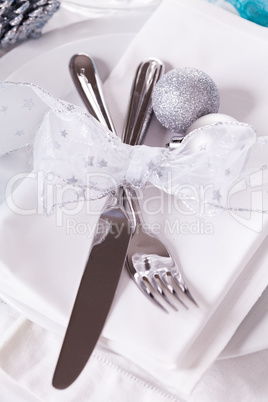 Stylish blue and silver Christmas table setting