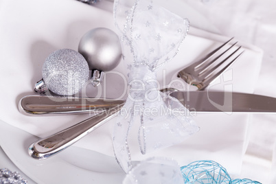 Stylish blue and silver Christmas table setting