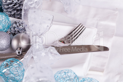 Stylish blue and silver Christmas table setting