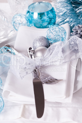 Stylish blue and silver Christmas table setting