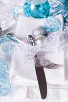 Stylish blue and silver Christmas table setting