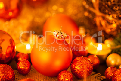 Warm gold and red Christmas candlelight background