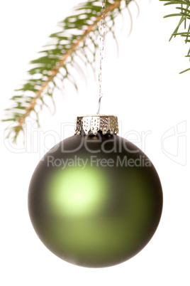 Christmas ball hanging from a branch of a fir tree