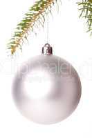 Christmas ball hanging from a branch of a fir tree