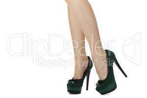Sexy Woman Legs in Green High Heel Shoes