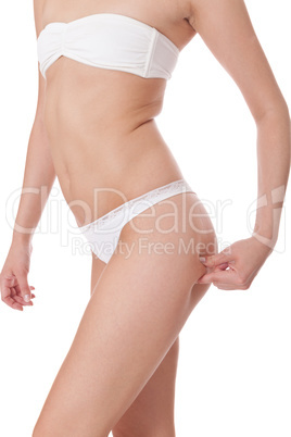 Shapely slender woman posing in lingerie