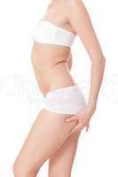 Shapely slender woman posing in lingerie