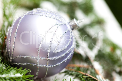 Silver Christmas ornaments in leaves Silver Christmas ornaments in leaves