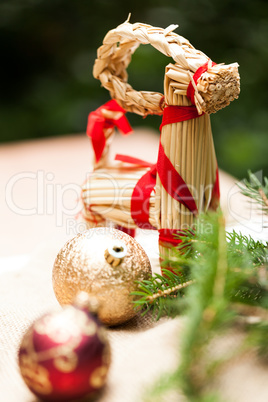 Gold Christmas ornament on leaves