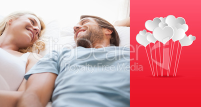 Composite image of cute couple lying on a bed