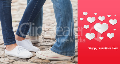 Composite image of couple in jeans standing on path